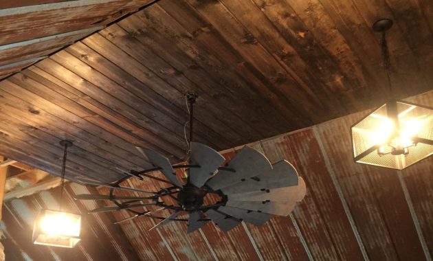 Rustic Barn Tin Ceiling With Windmill Ceiling Fan Hootens Home throughout proportions 2448 X 2414