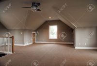 Unfinished Attic Of A Home It Is Empty Except For A Ceiling Stock within size 1300 X 866