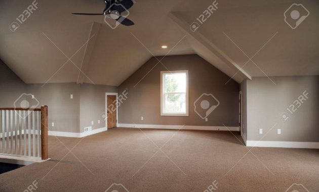 Unfinished Attic Of A Home It Is Empty Except For A Ceiling Stock within size 1300 X 866