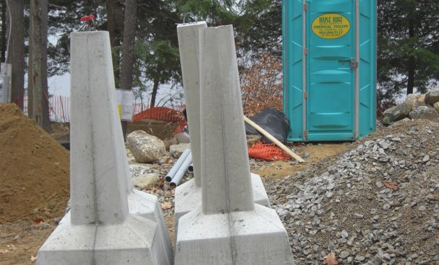Best Foundation For A Deck Is A Set Of Precast Concrete Piers within size 1309 X 1746