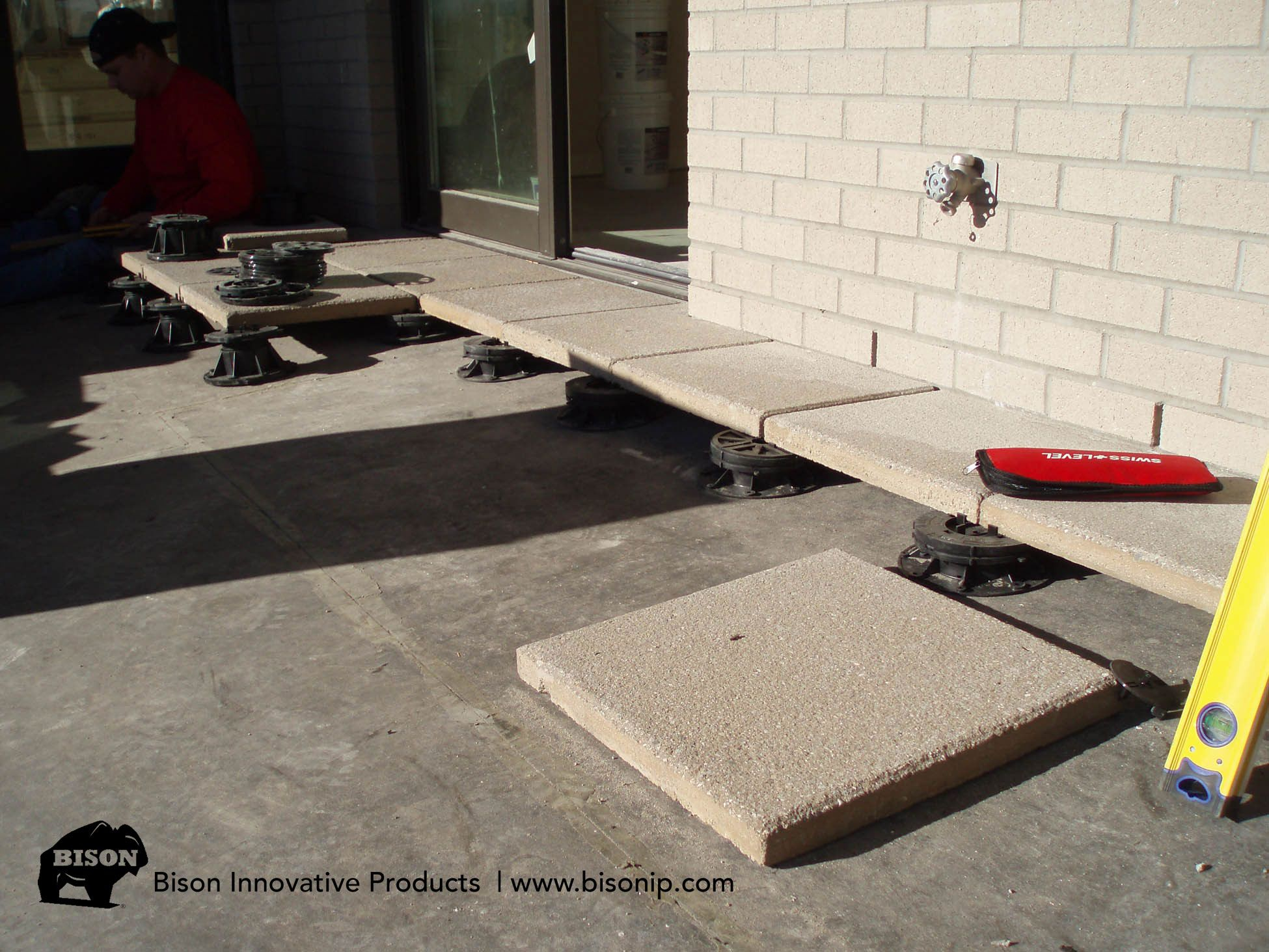 Bison Adjustable Deck Supports Pation Installion Using Concrete in size 1950 X 1463