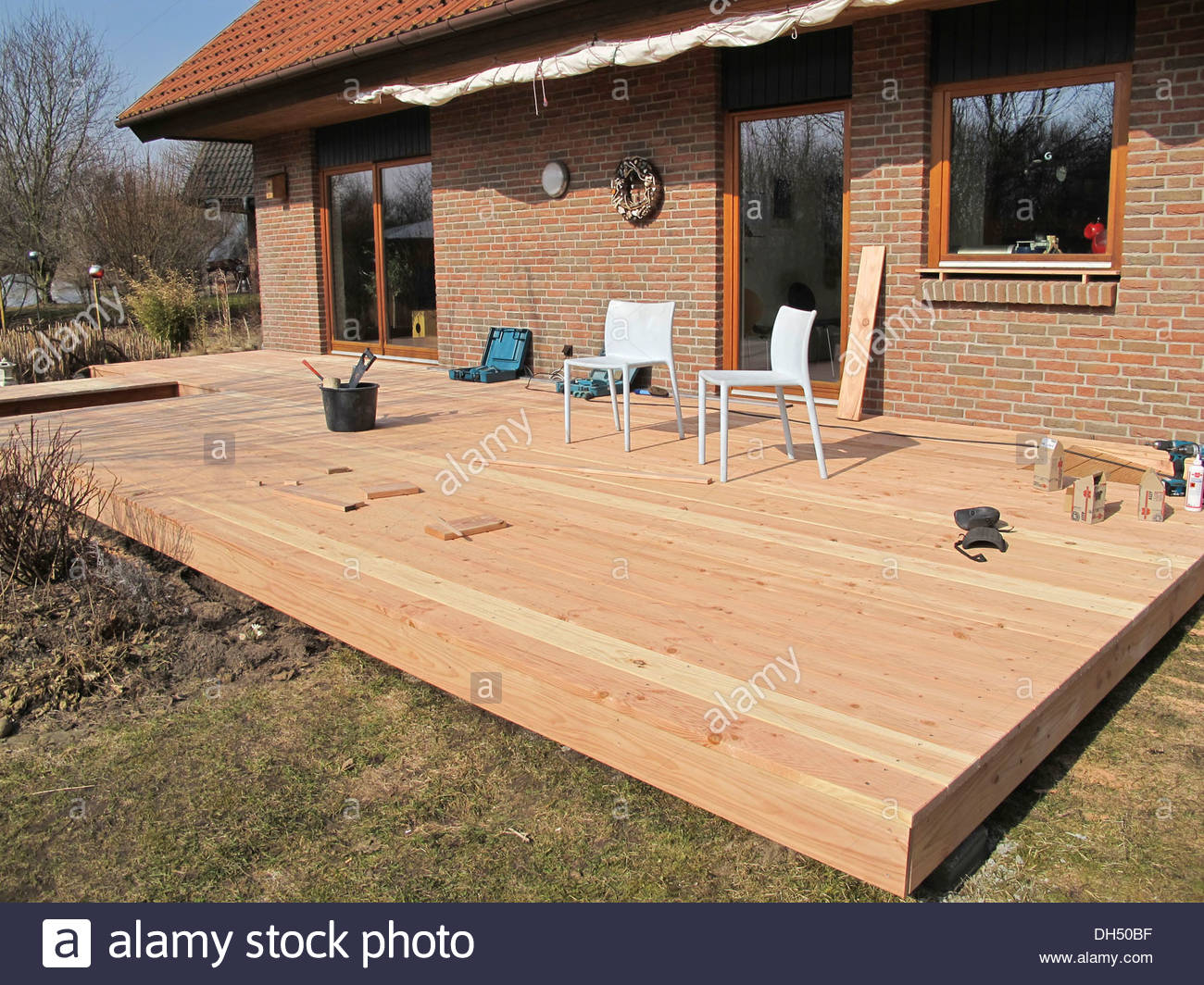 Construction Of A Wooden Deck From Douglas Fir Planks Stock Photo with size 1300 X 1064