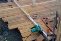 Decking Project Laying Boards And Cutting The Edge To Size with dimensions 900 X 1200