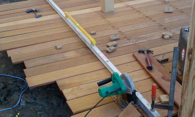 Decking Project Laying Boards And Cutting The Edge To Size with dimensions 900 X 1200