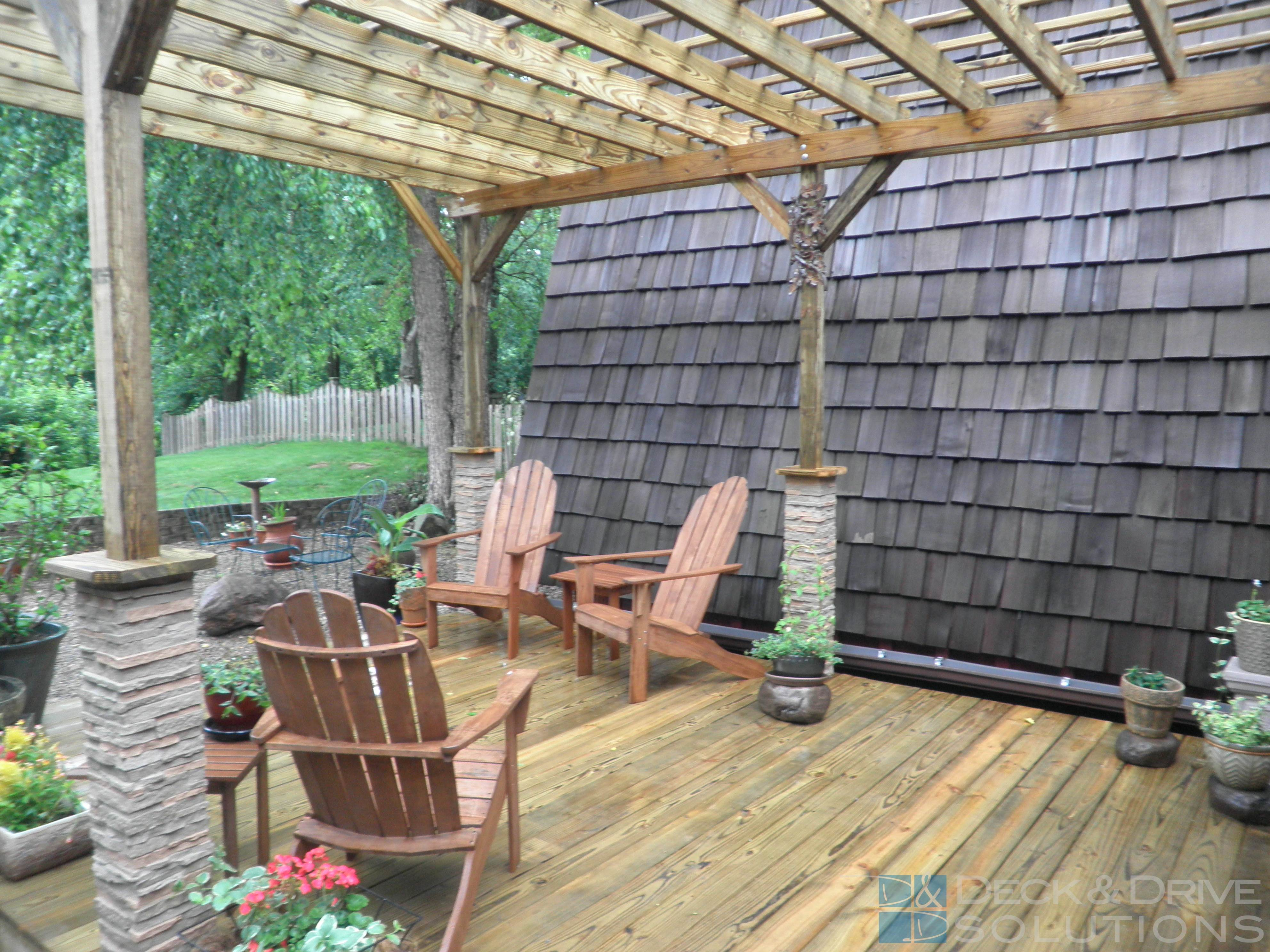 Front Porch And Pergola With Stone Wrapped Posts Des Moines Deck pertaining to measurements 3968 X 2976