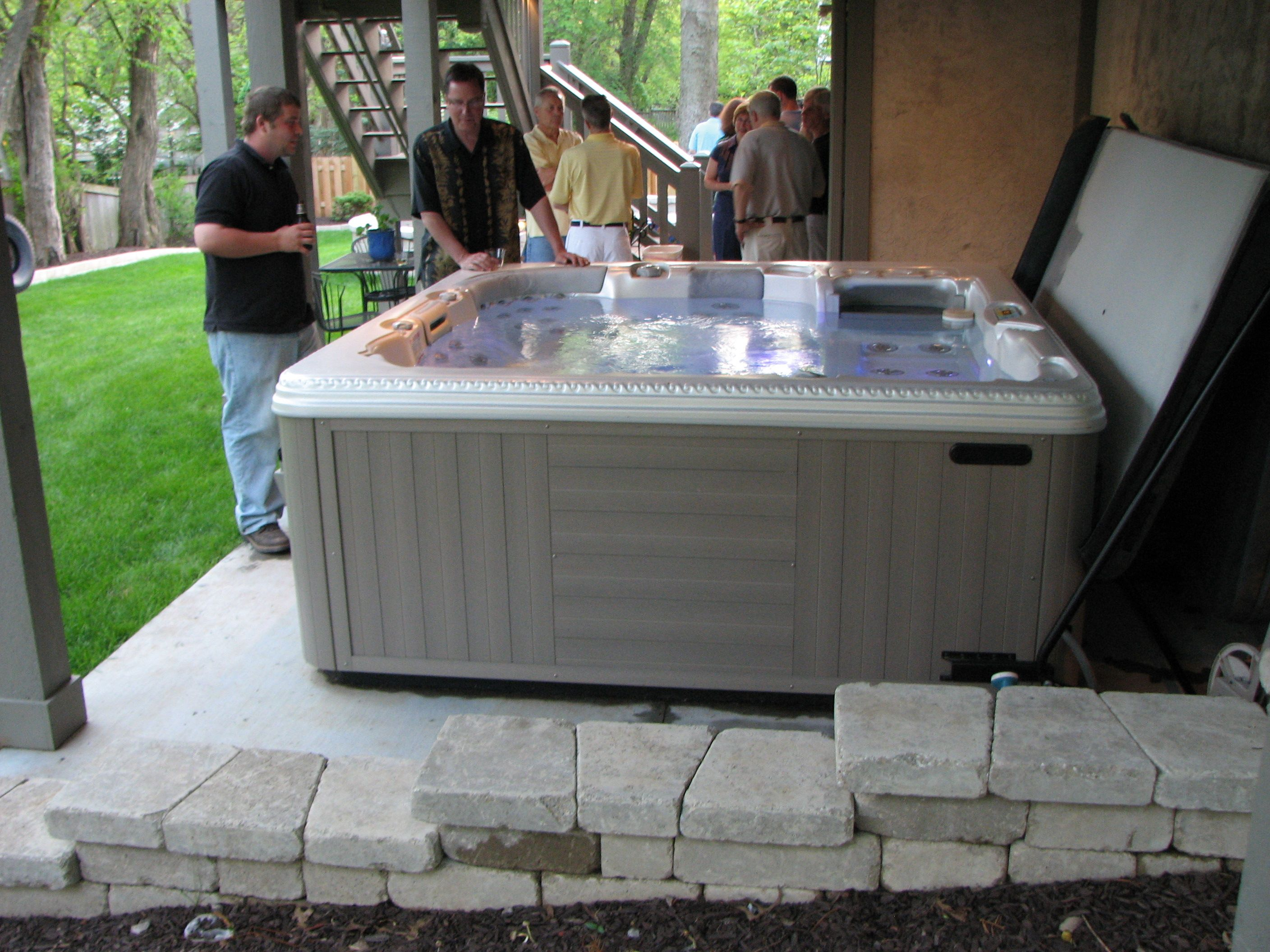 Hot Tub Fits Neatly Under A Tall Deck And Is Connected To The Patio for dimensions 2816 X 2112