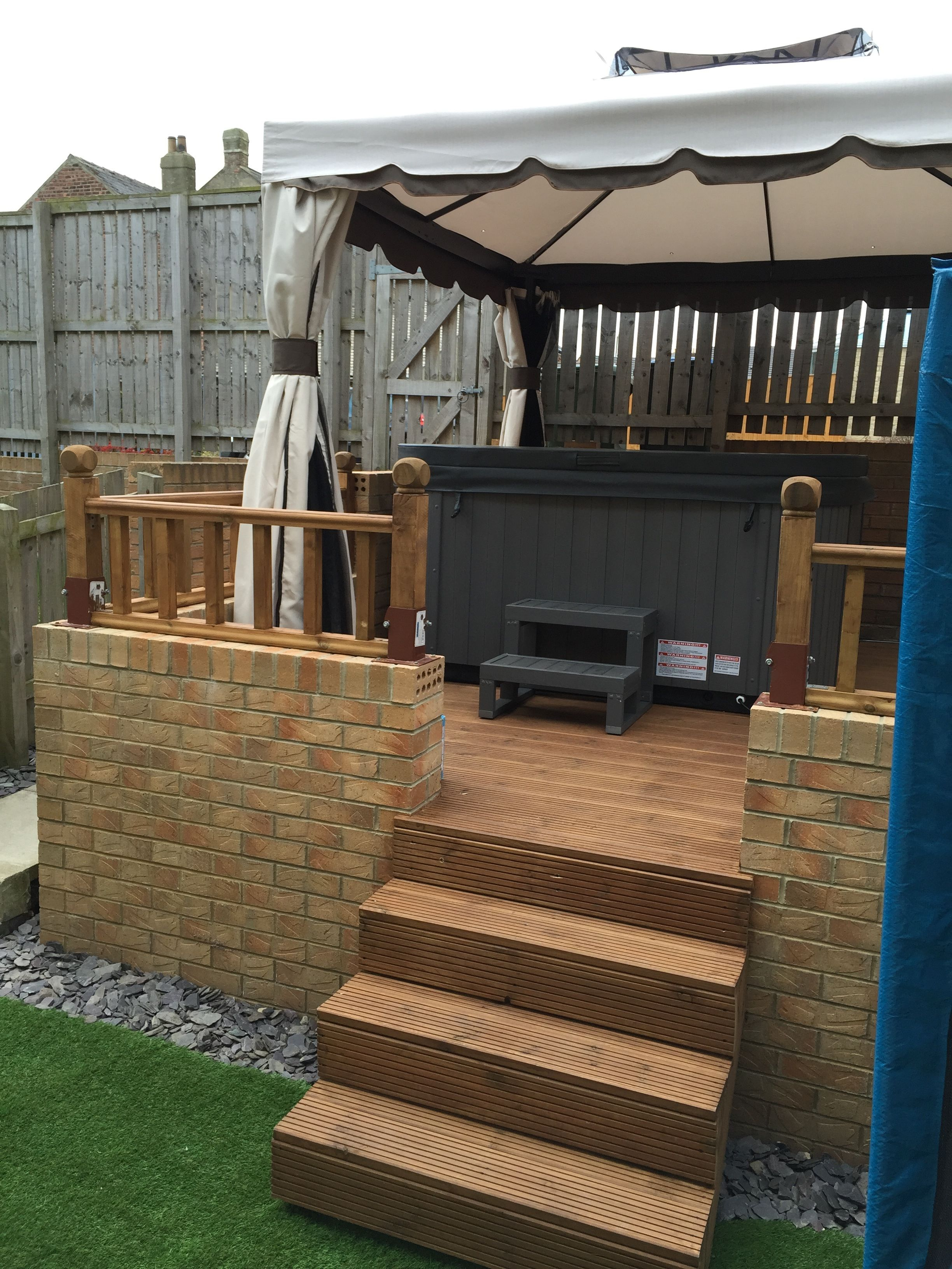 Hot Tub Positioned On Raised Reinforced Decking With Steps Brick in dimensions 2448 X 3264