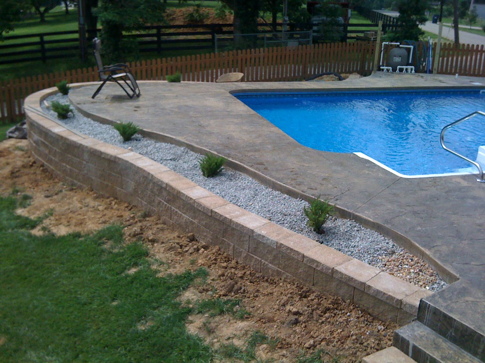 Inground Pool With Retaining Wall An Inground Liner Pool With A inside dimensions 1600 X 1200