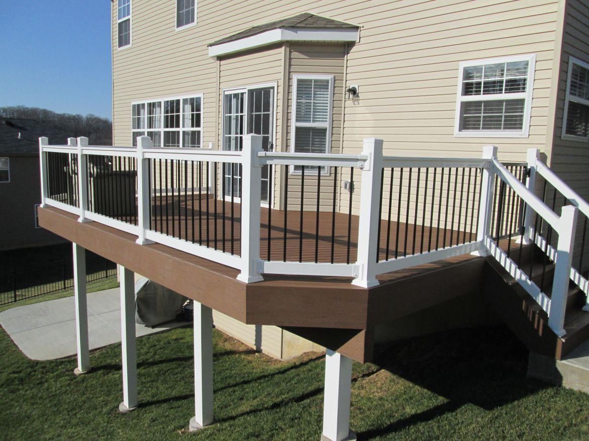 Low Maintenance Raised Deck With Decorative Rails And Post Covers intended for sizing 1168 X 876