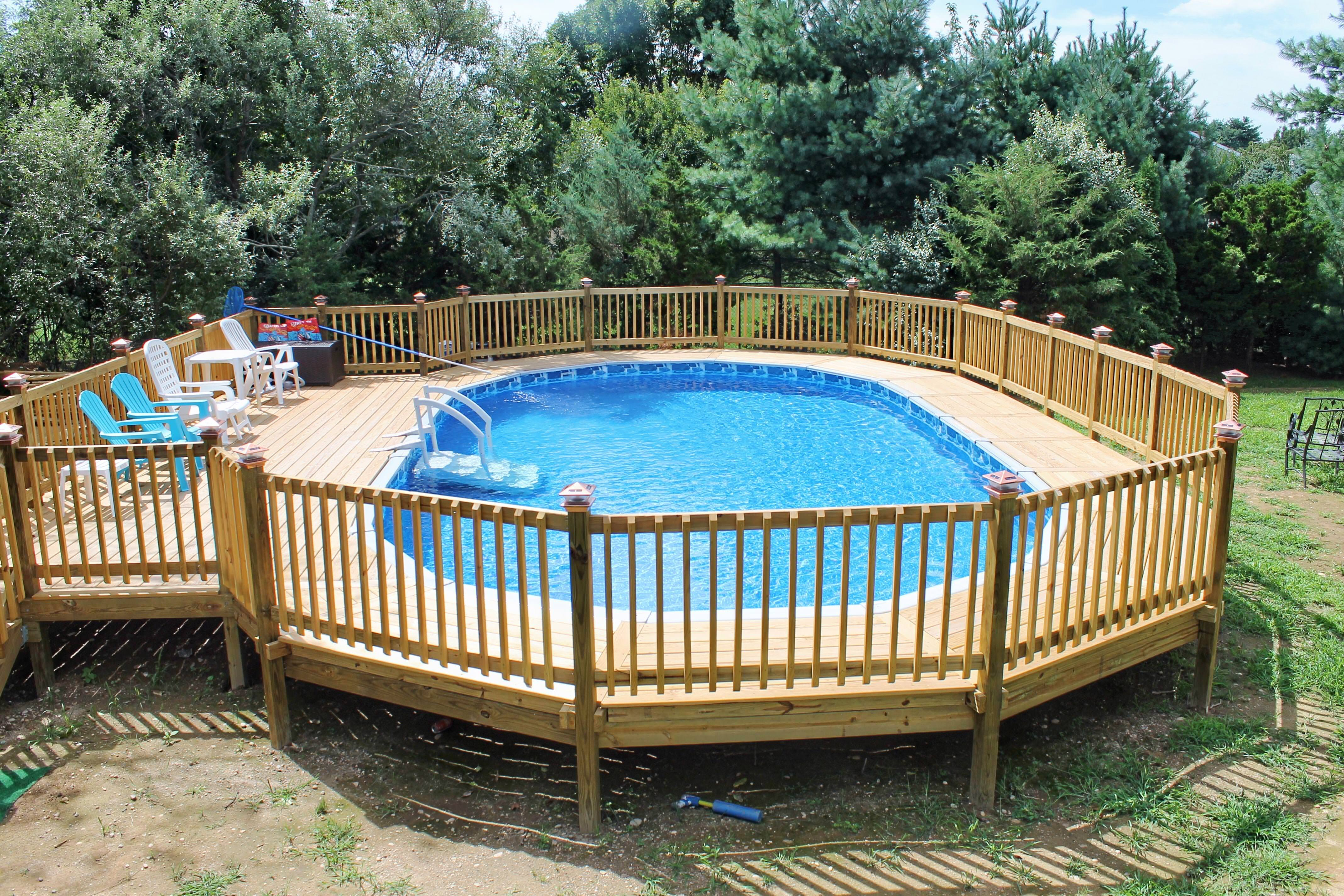 Octagonal Above Ground Swimming Pool Design With Wooden Deck Around with measurements 4272 X 2848