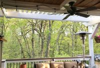 Partially Covered Deck With Pergola And Ceiling Fan Dark And White with measurements 3024 X 4032