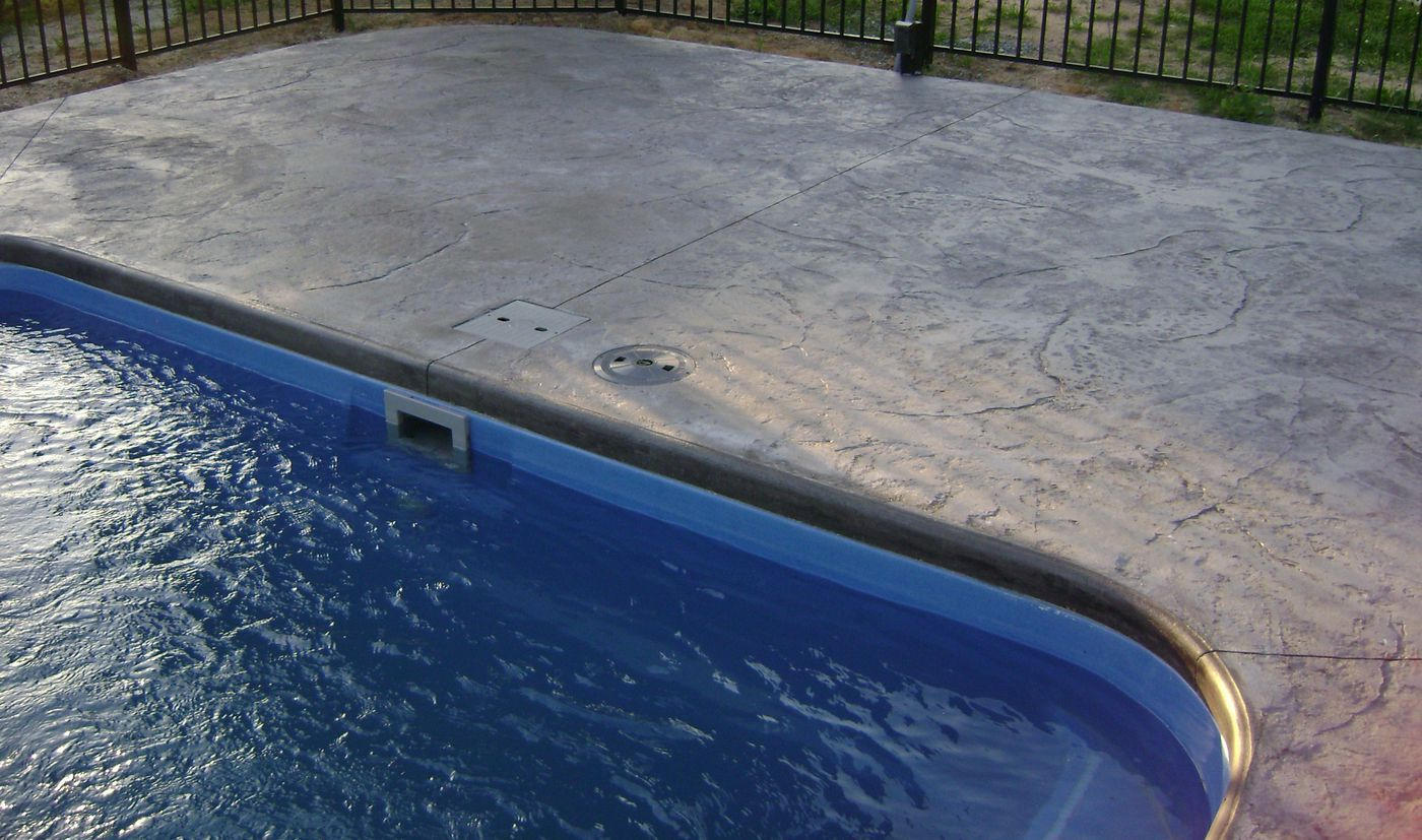 Pool Patio Materials Stamped Concrete Vs Pavers inside sizing 1400 X 827