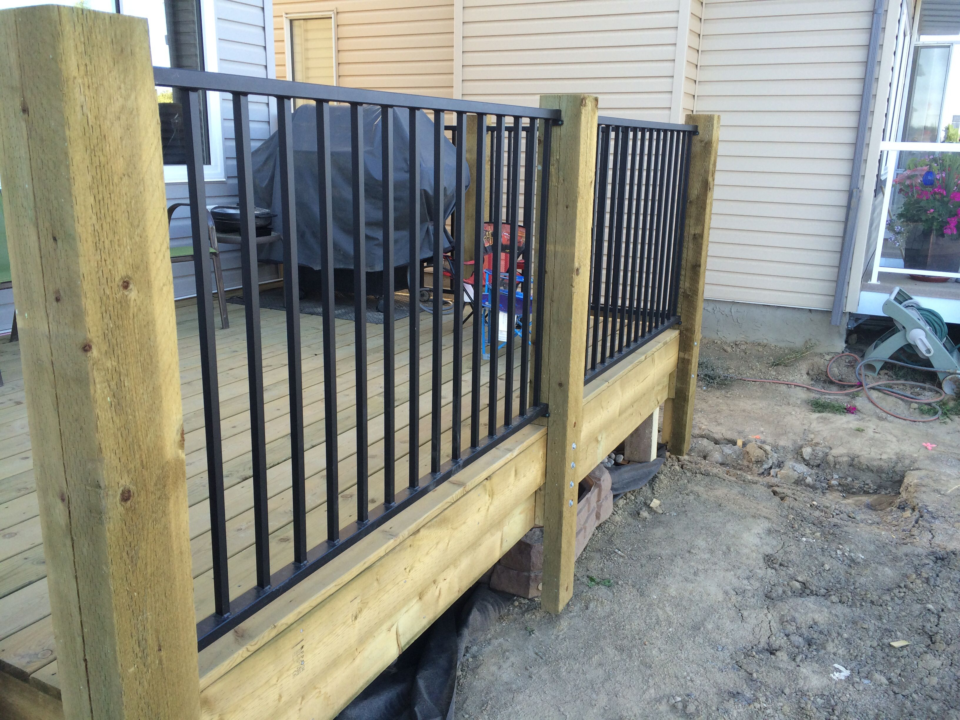 Rustic 6x6 Posts With Powder Coated Fortress Aluminum Railing in sizing 3264 X 2448