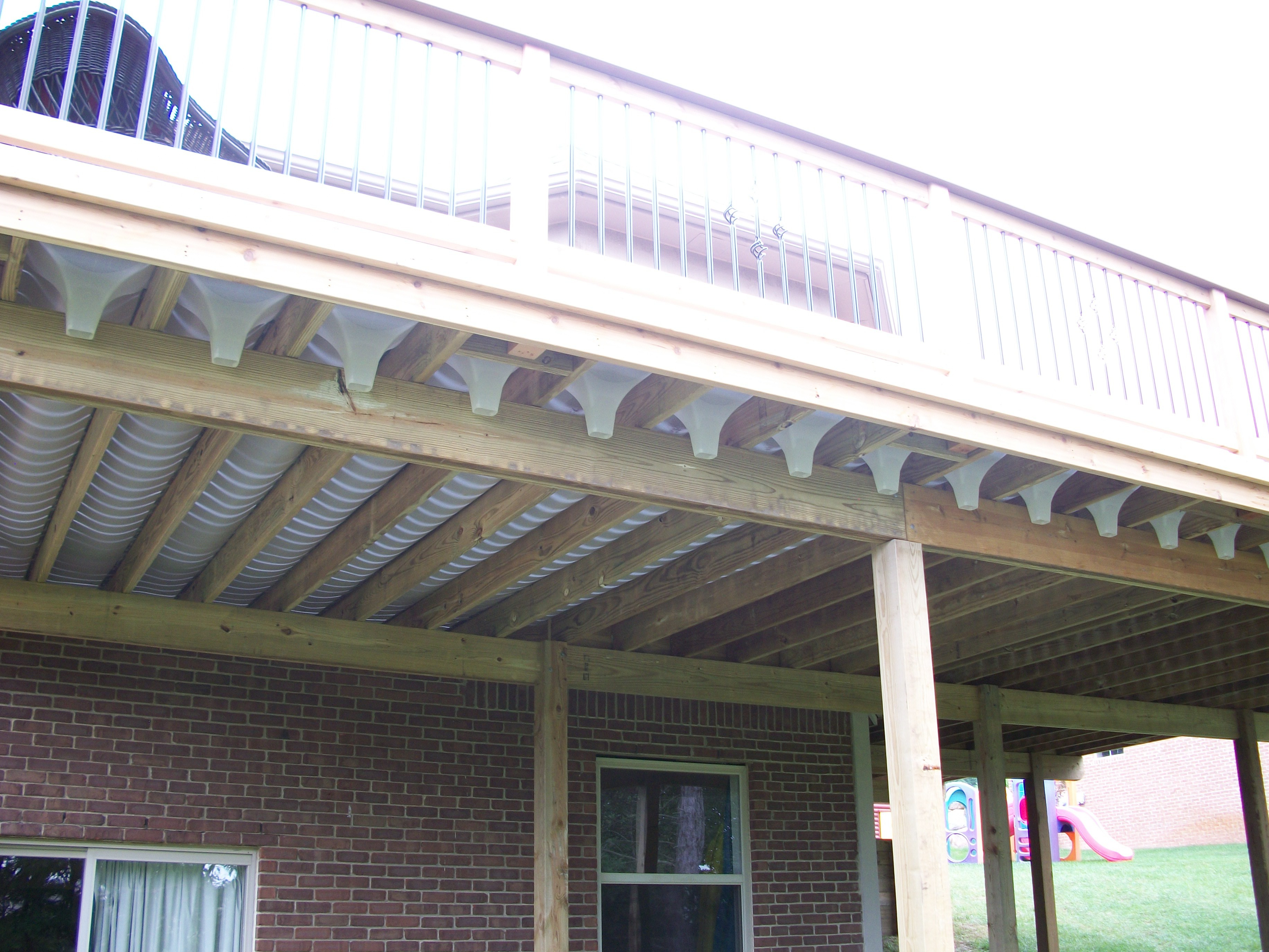 Southeastern Michigan Under Deck Drainage System Rainescape with dimensions 3664 X 2748