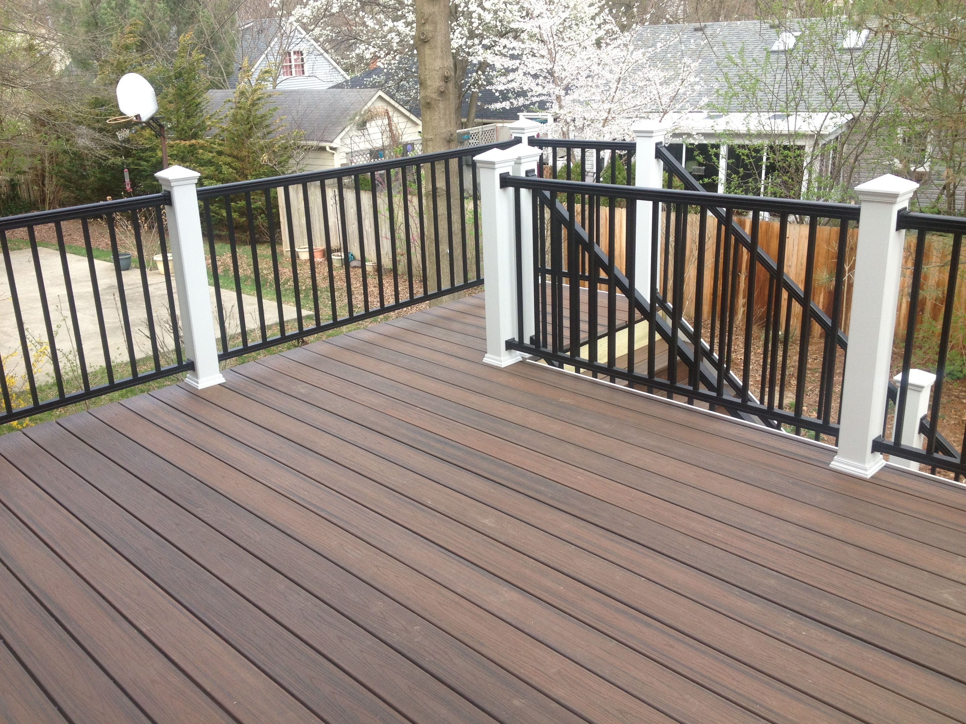 Trex Spiced Rum Decking With White Post Sleeves And Black Aluminum in sizing 3264 X 2448