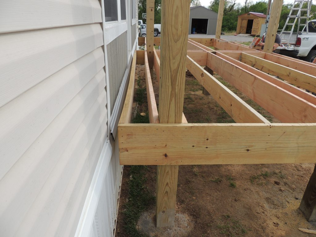 Two Tier Deck Framing And Installing Deck Boards Laying Around Posts with regard to size 1024 X 768