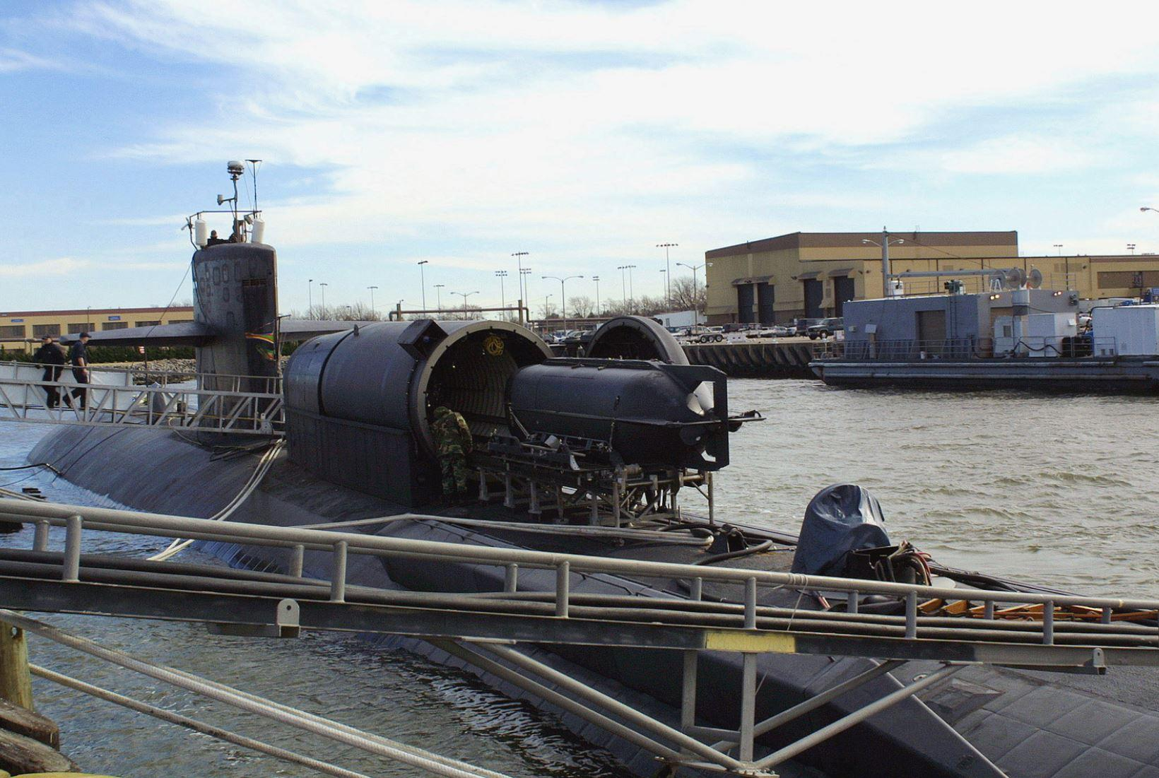 Uss Dallas Ssn 700 Sits Pier Side While A Seal Delivery Vehicle Is regarding size 1640 X 1101