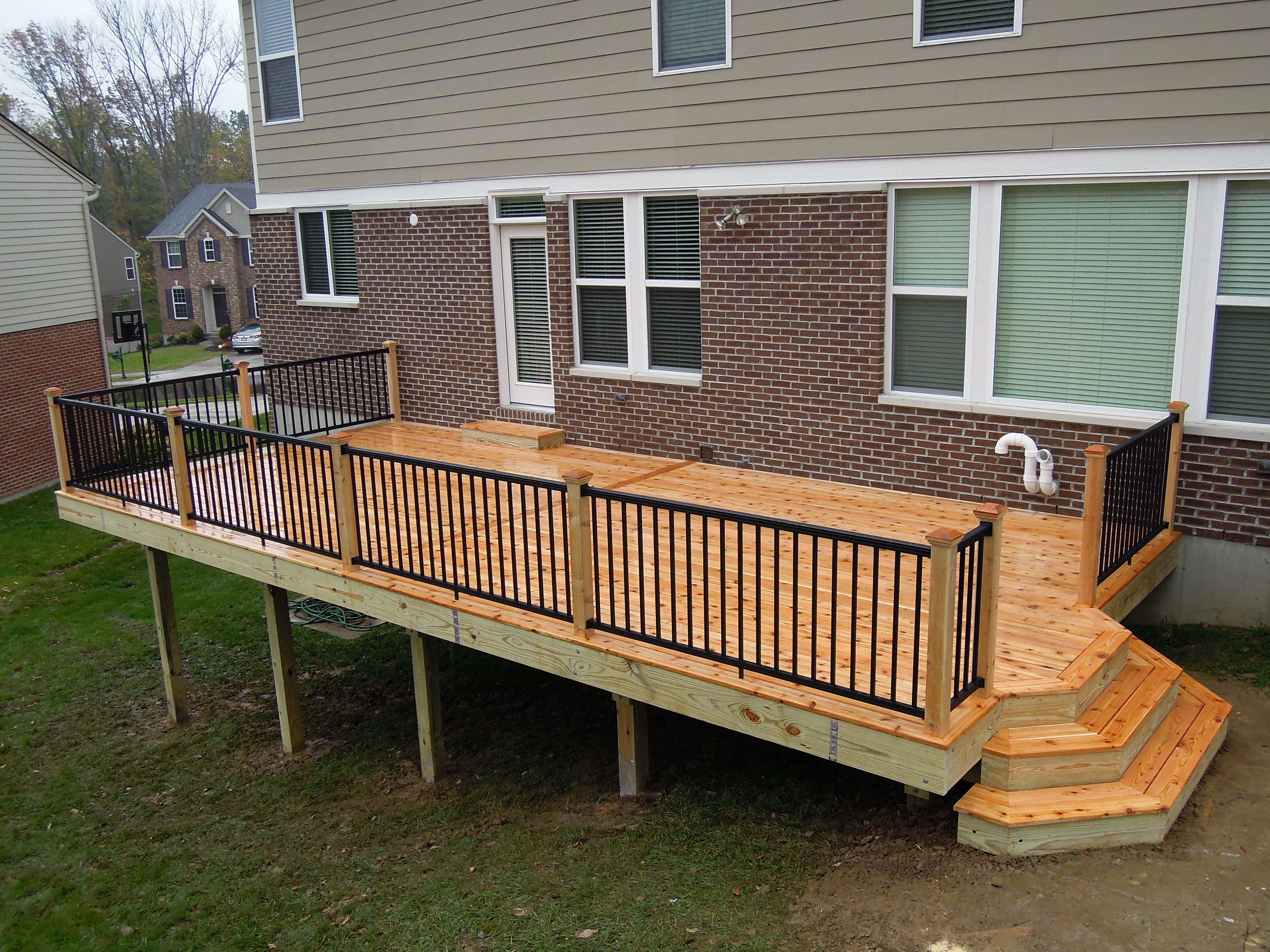 Western Red Cedar Deck With Black Aluminum Railing And Custom Steps for size 4000 X 3000