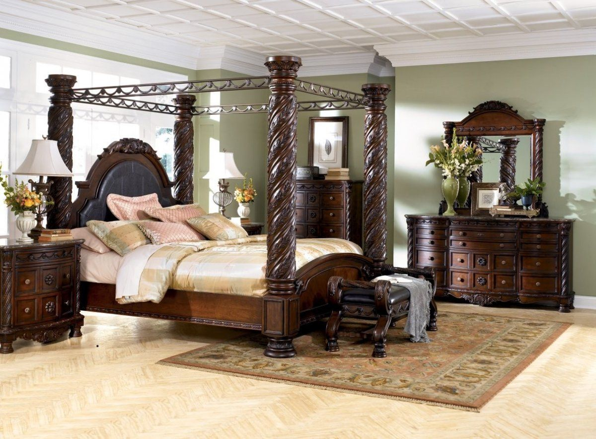 Mid Century King Size Bedroom Sets With 4 Big Pillars Curved Dark for dimensions 1200 X 885