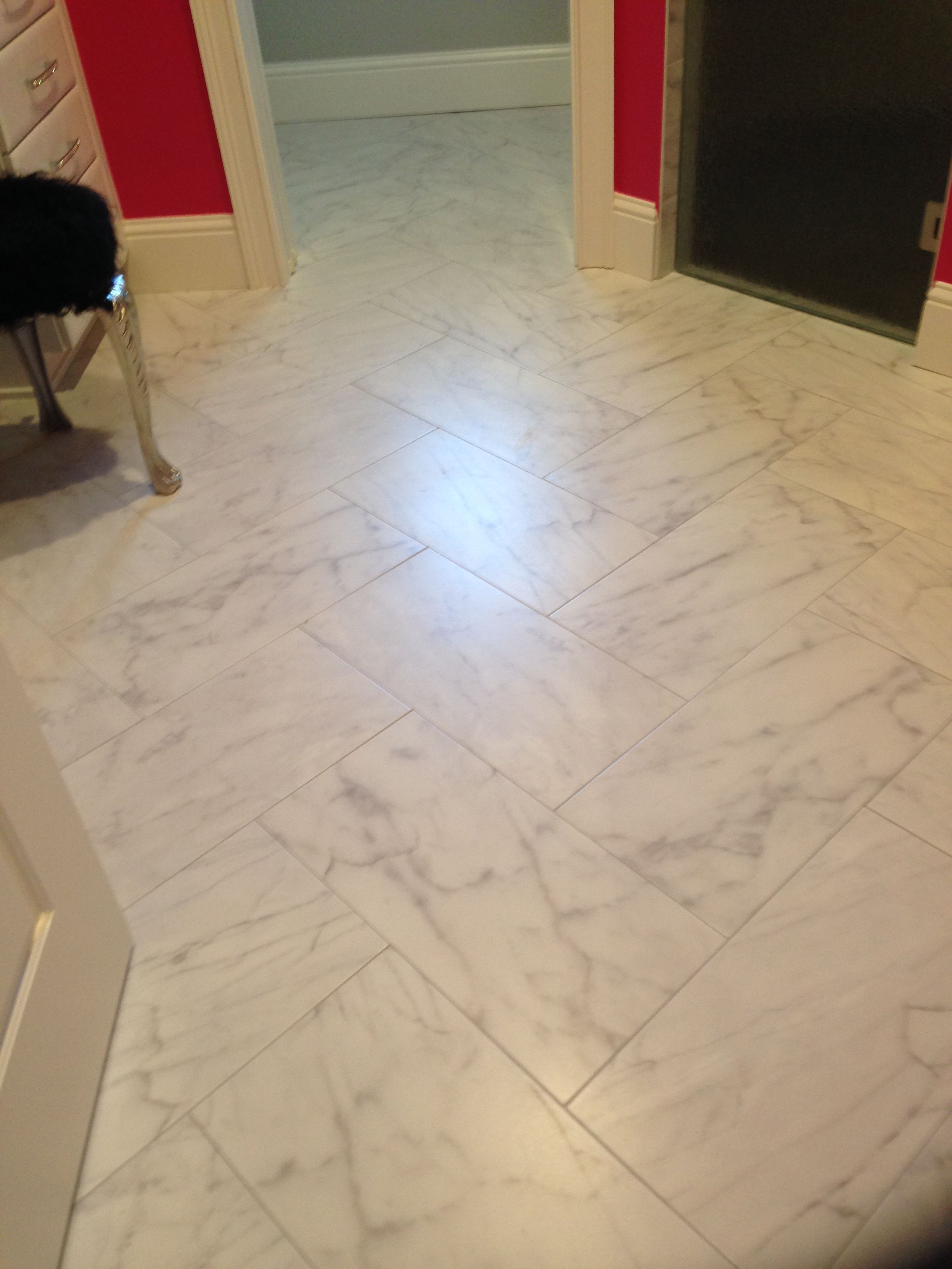 12 X 24 Carrara Look Porcelain Tile In Herringbone Pattern in sizing 2448 X 3264