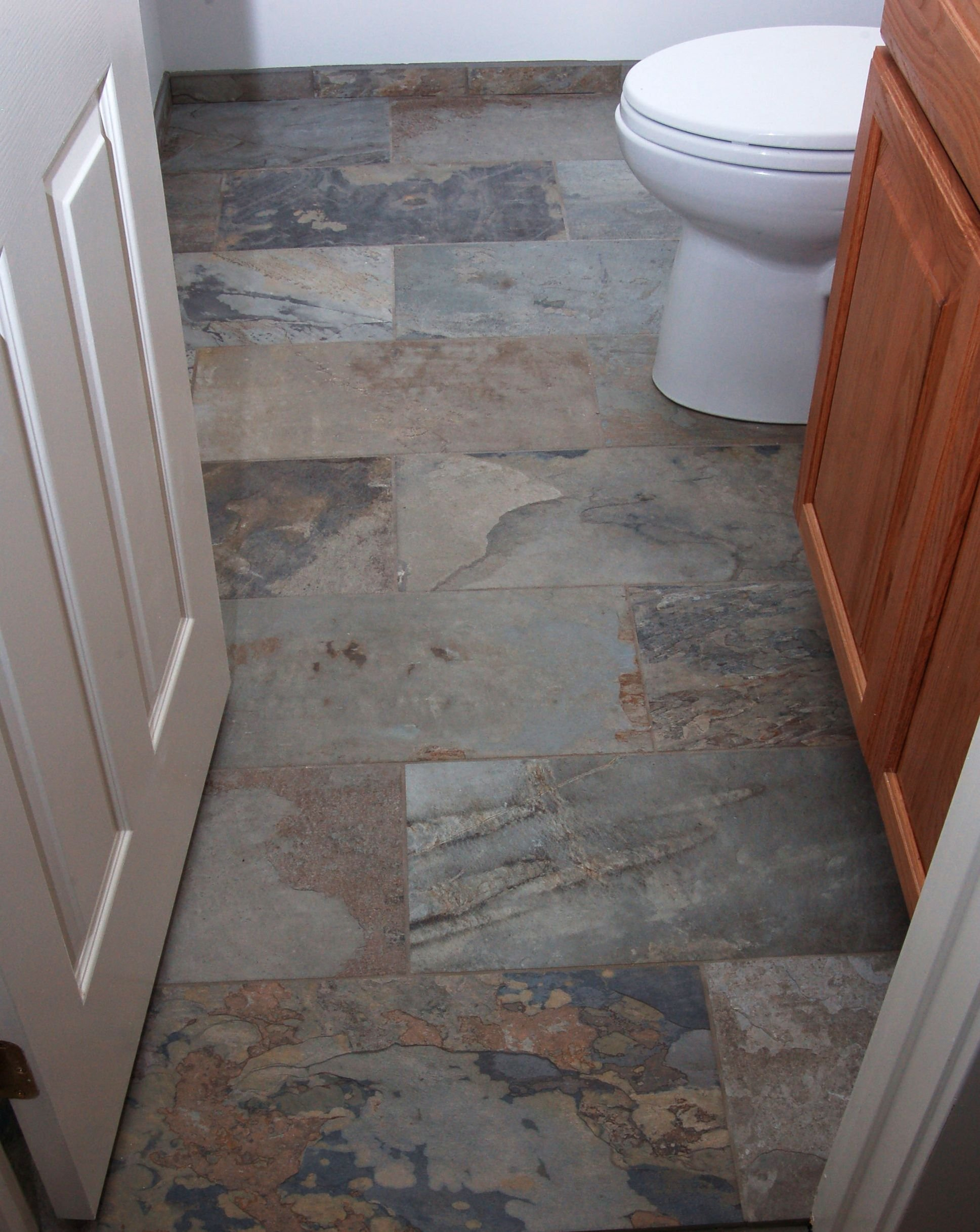 Floor Tile Debate Stone Vs Porcelain Pro Construction Blue for sizing 1937 X 2435