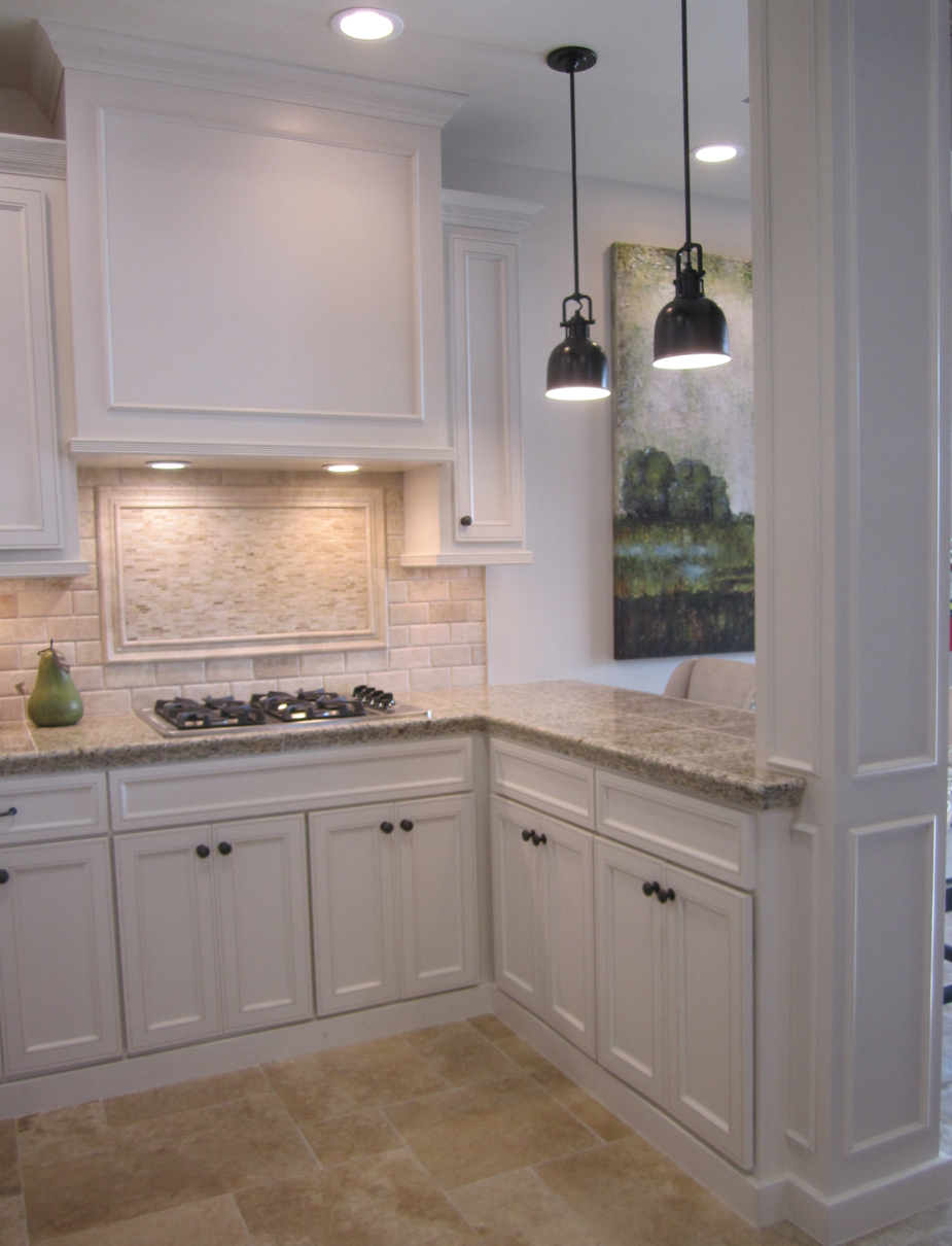 Kitchen With Off White Cabinets Stone Backsplash And Bronze within proportions 925 X 1210