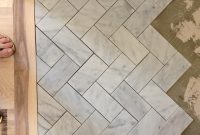 Subway Tile In A Herringbone Pattern On The Floor intended for size 1200 X 1600