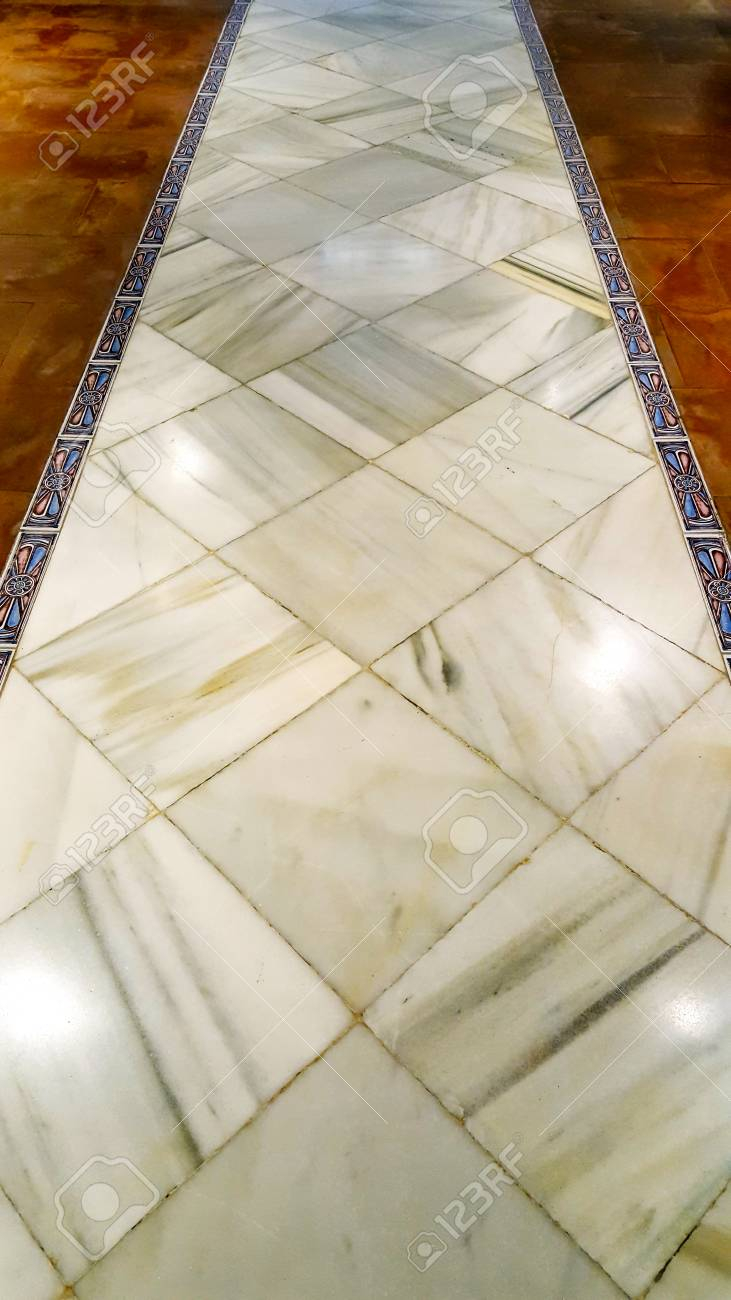 White Stone Marble Floor With Decorative Blue Border And Brown intended for size 731 X 1300